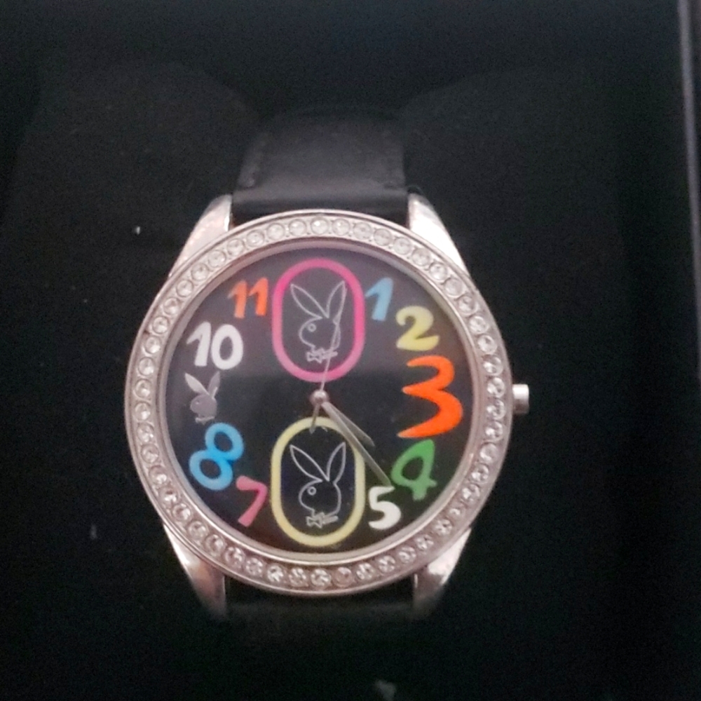 Playboy Bunny wrist watch with leather band metal clasp